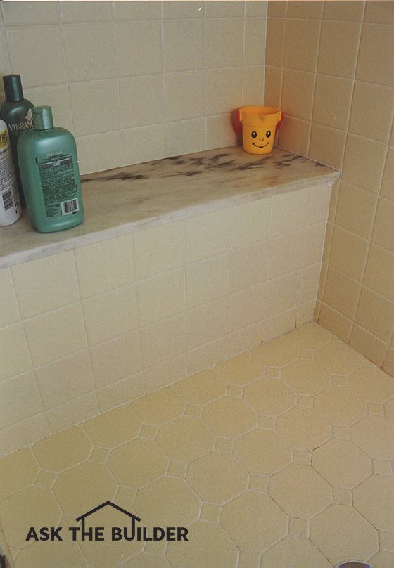 shower seat with smiley face cup