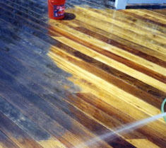 wood deck being cleaned with Stain Solver