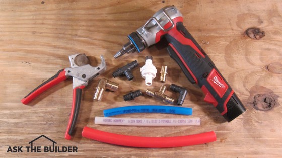 Here are different pieces of pex pipe, fittings and a cool cordless expanding tool that allows you to make connections in seconds. Photo credit: Tim Carter