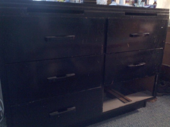The dresser with the missing drawer. Before the project begins.
