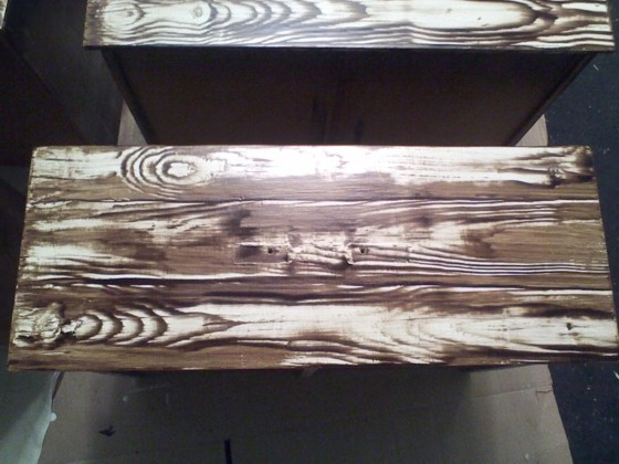 Close-up of the drawer front with its fake wood grain design.