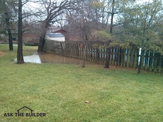 This ponding of rainwater is not normal. The next door neighbor blocked the natural swale with a new swimming pool. Photo credit: Tim Carter