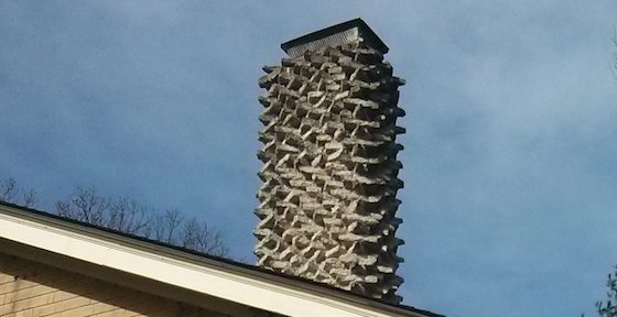 Here's a closeup of the top of the chimney. There's no overhanging concrete cap or crown. Photo credit: Tim Carter