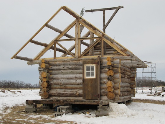 log cabin that Dick Anderson is working on.