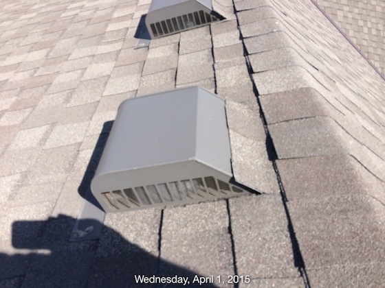 Here's Dr. Jane's pot or turtle vents. Those upturned shingles are creating a spot where wind-driven rain can gain access to the underside of the vent flashing with relative ease. Photo credit: Someone holding a smart phone camera