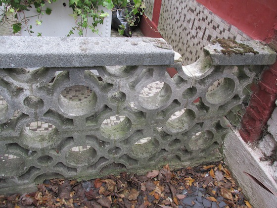 Bernadette is talking about repairing the missing chunk of concrete cap. Photo credit: Bernadette Snoussi