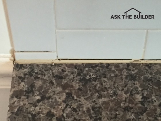 This grout line crack on top of the granite top is quite normal in a new home. Photo Credit: Dave Waters