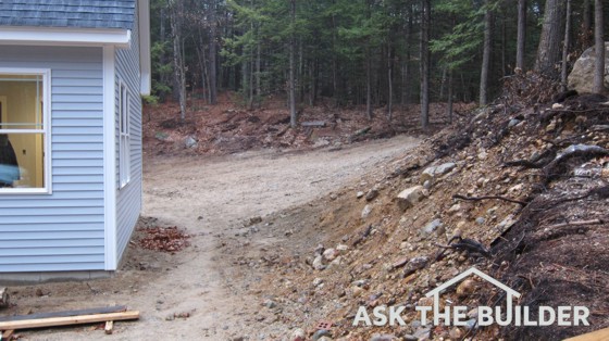 Storm water is going to rush down the hill on the right and overwhelm this home!. Photo Credit: Tim Carter