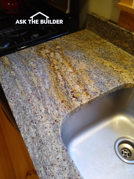 granite countertop with stain