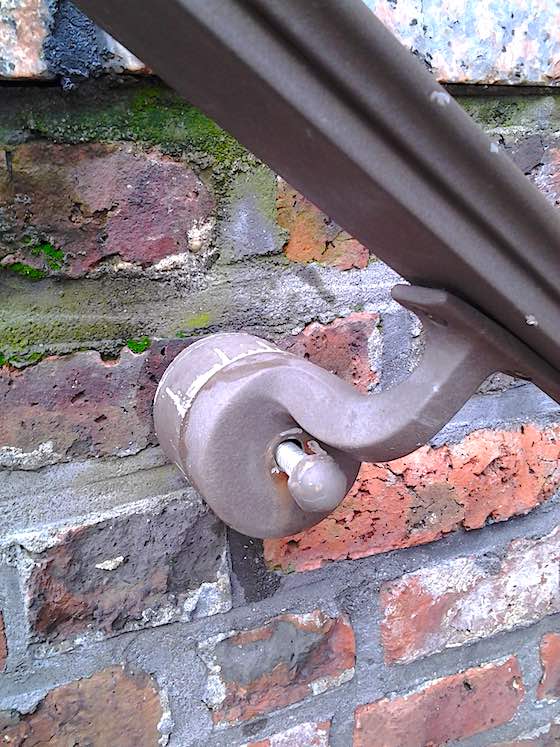 repair handrail in brick or concrete