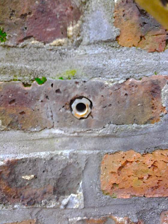 repair handrail in brick