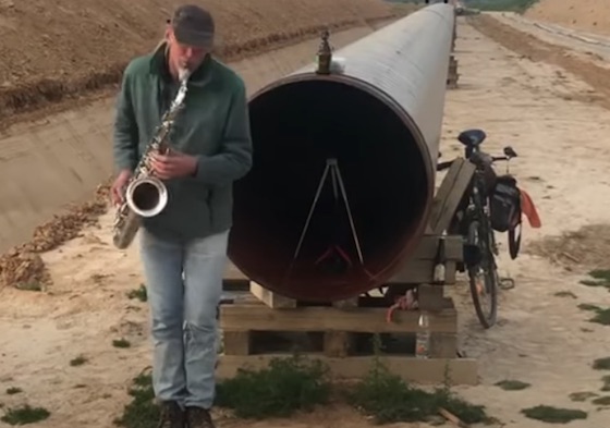 saxophone player creates pipeline echo